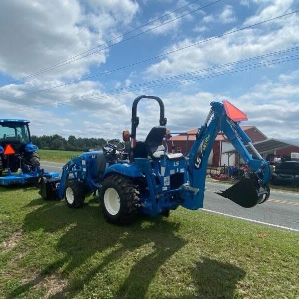LS Lawn Mower with front loader and rear backhoe loader